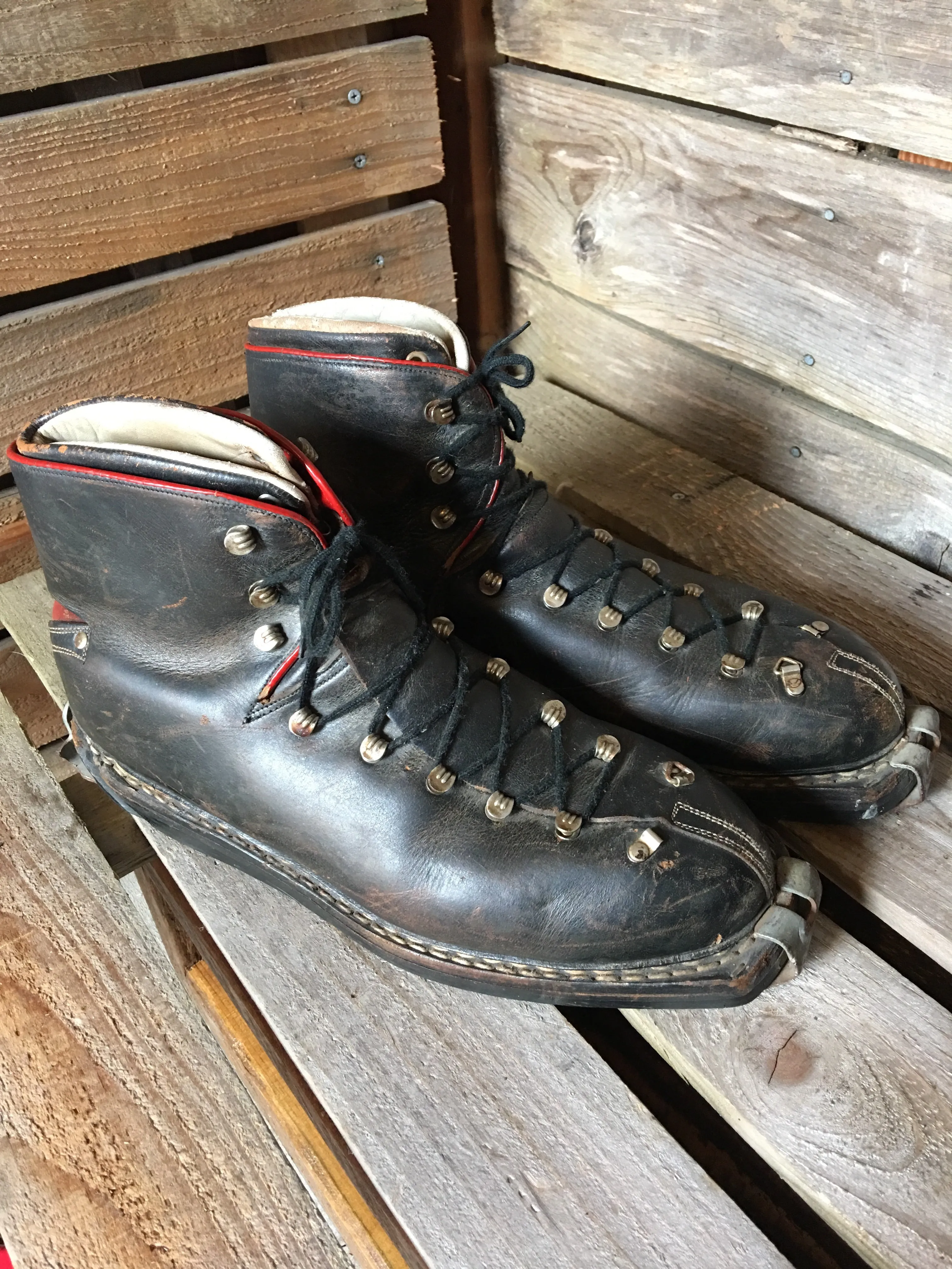 Classic Black Leather Ski Boots with Red Accents