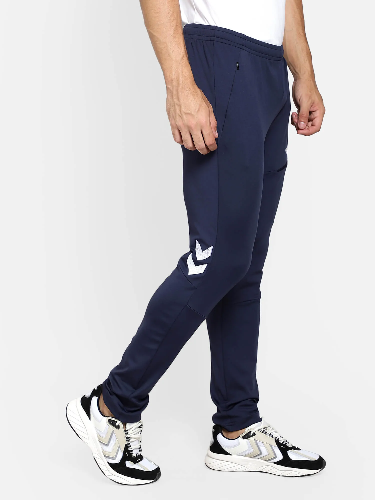 Football Solid Regular fit Polyester Trackpants for Men with zipper pockets Comfortable Breathable Fabric Stretchable for Everyday Use Ideal for Yoga Training Gym Running or Performance